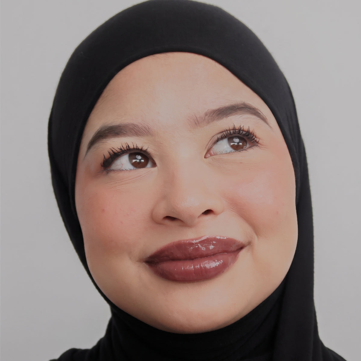 Peptide Glo Lip Oil in Coffee Run worn on model (4 of 4)