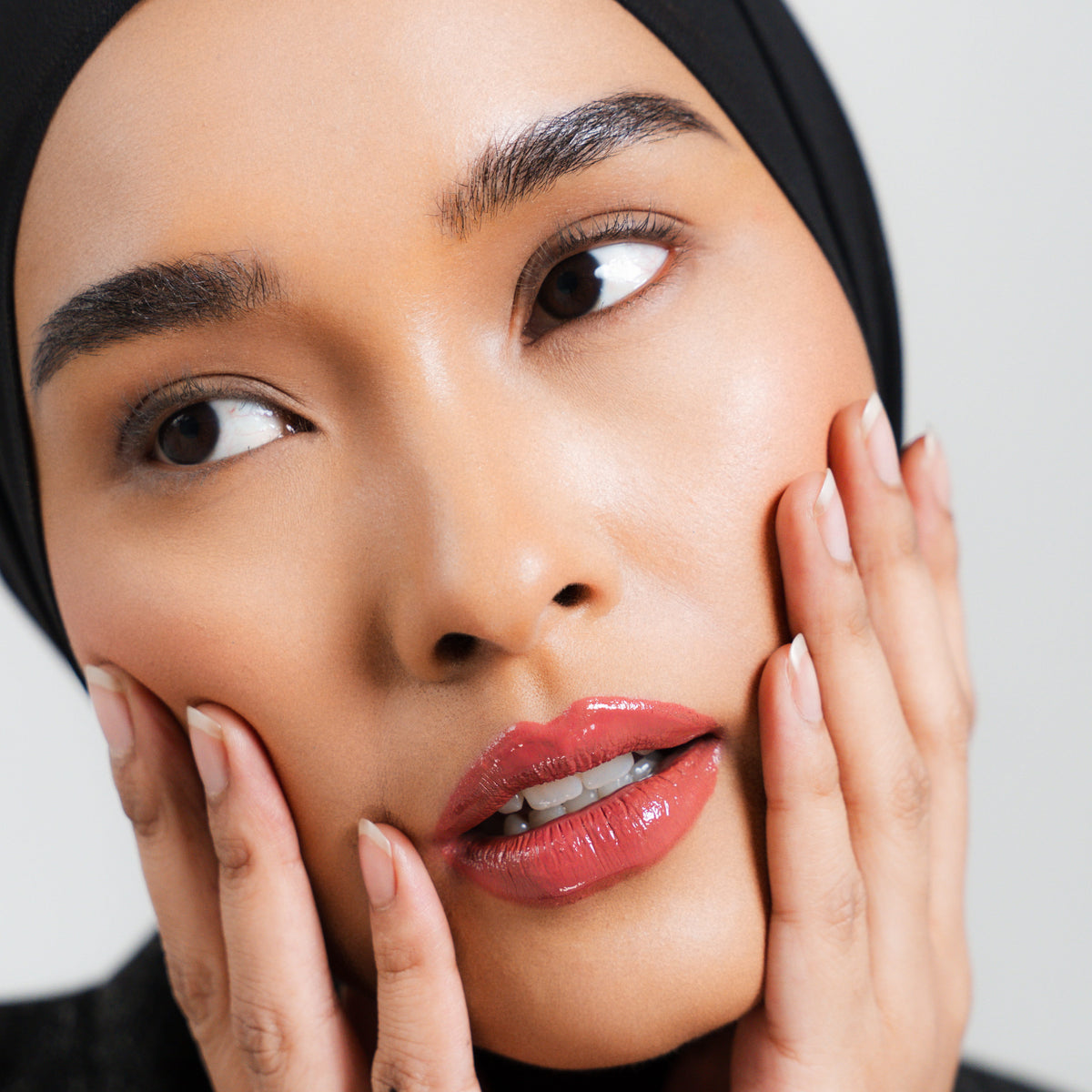 Peptide Glo Lip Glaze in Crush on medium skin