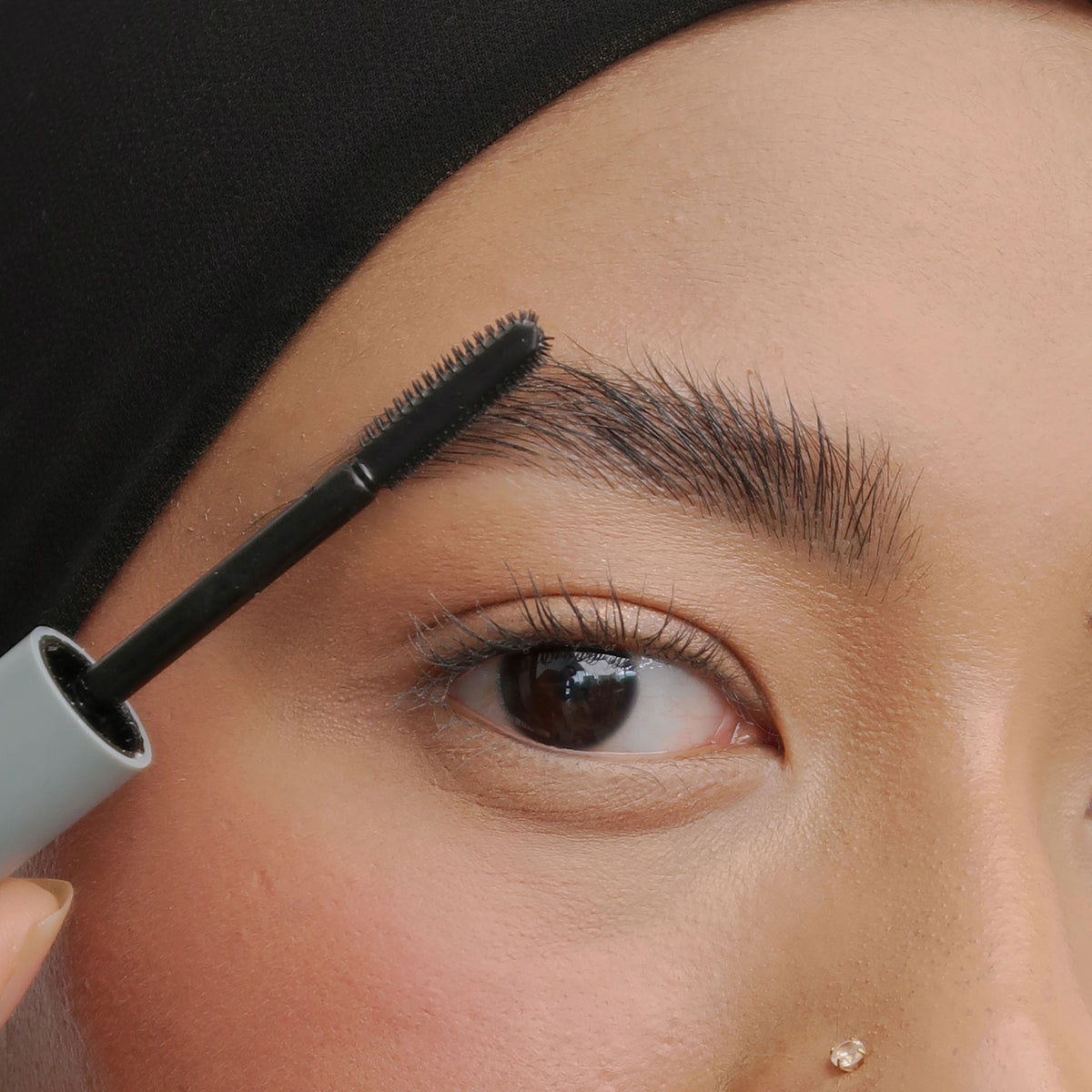 Hydra-Hold Brow Gel groomed brows on medium skin