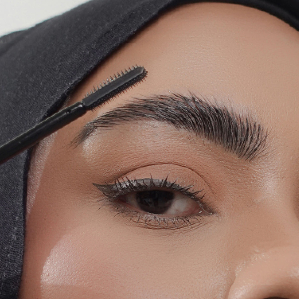 Hydra-Hold Brow Gel groomed brows on tan skin