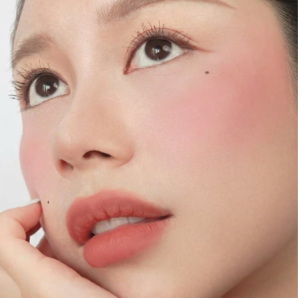 Hyaluronic Liquid Blush in Bubblegum Pop on fair skin