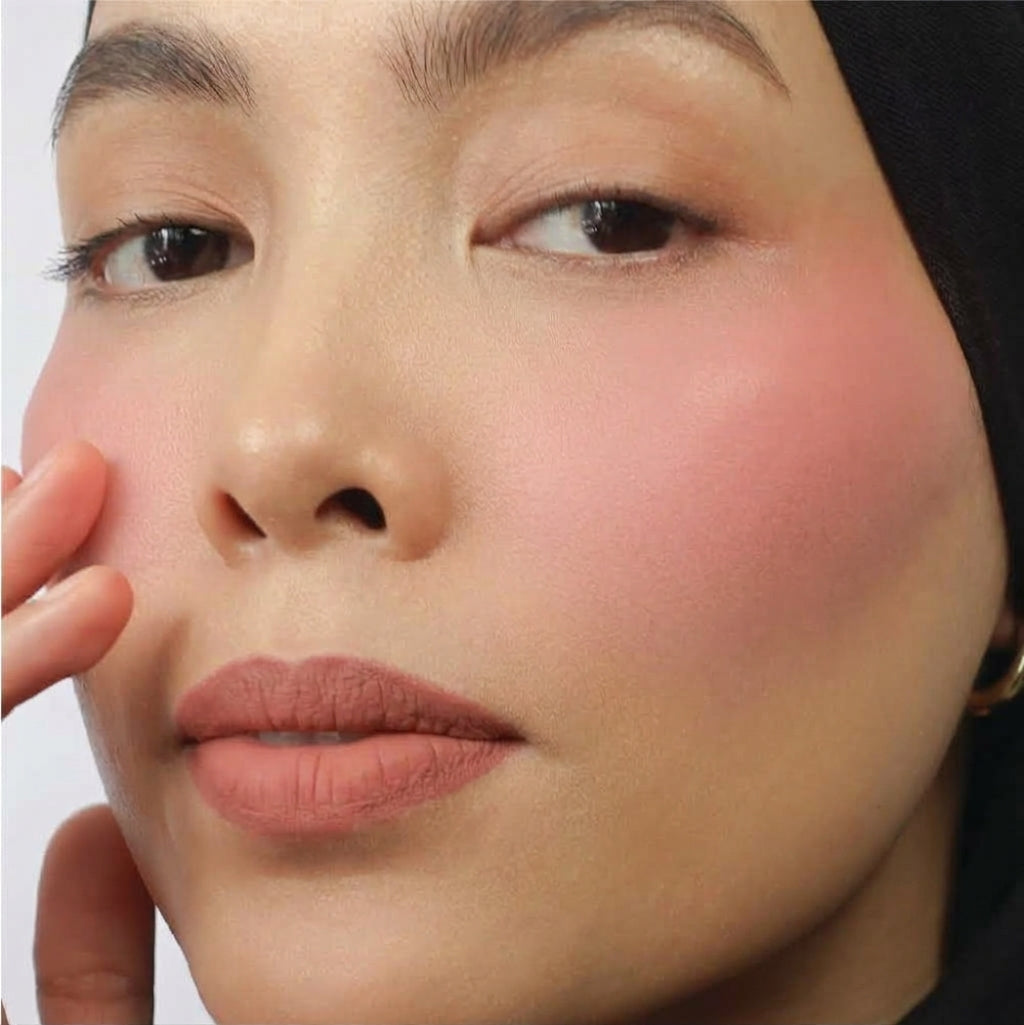 Hyaluronic Liquid Blush in Bubblegum Pop on medium skin