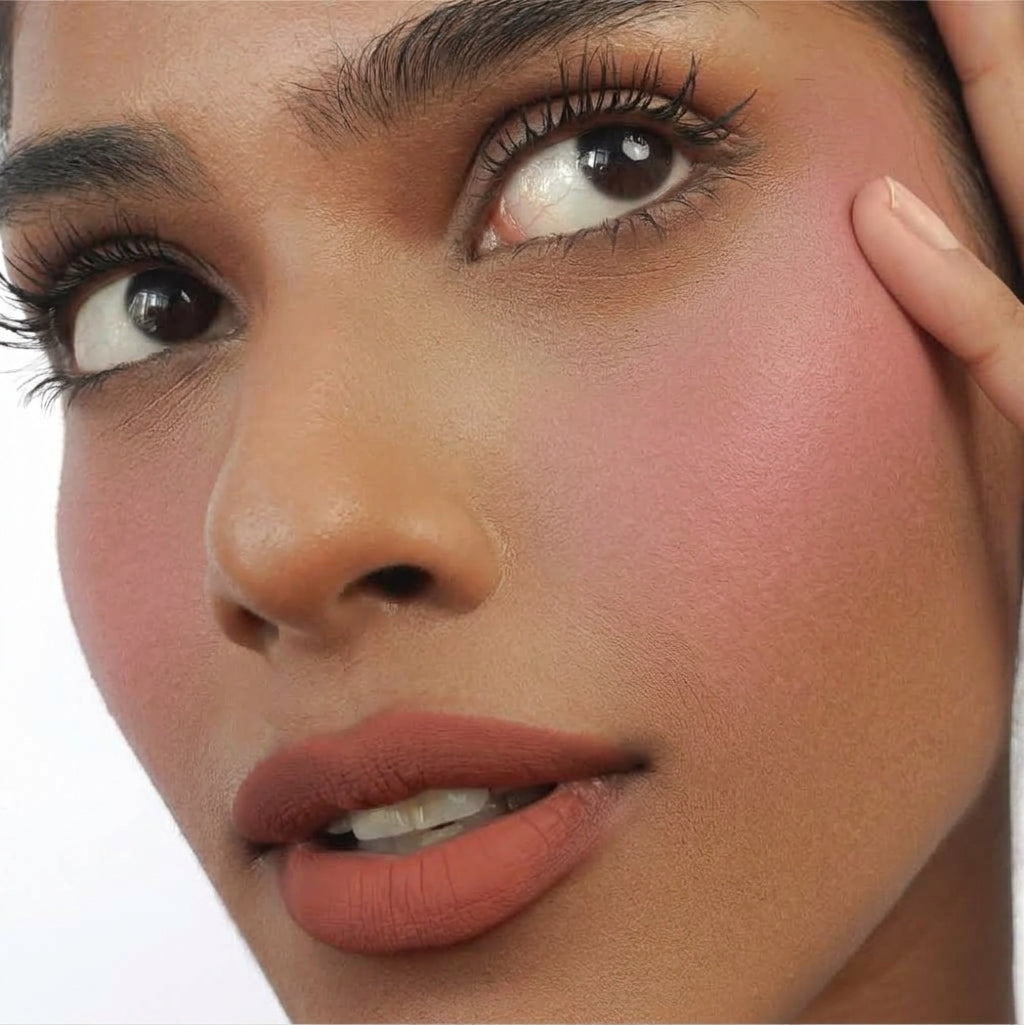 Hyaluronic Liquid Blush in Bubblegum Pop on tan skin