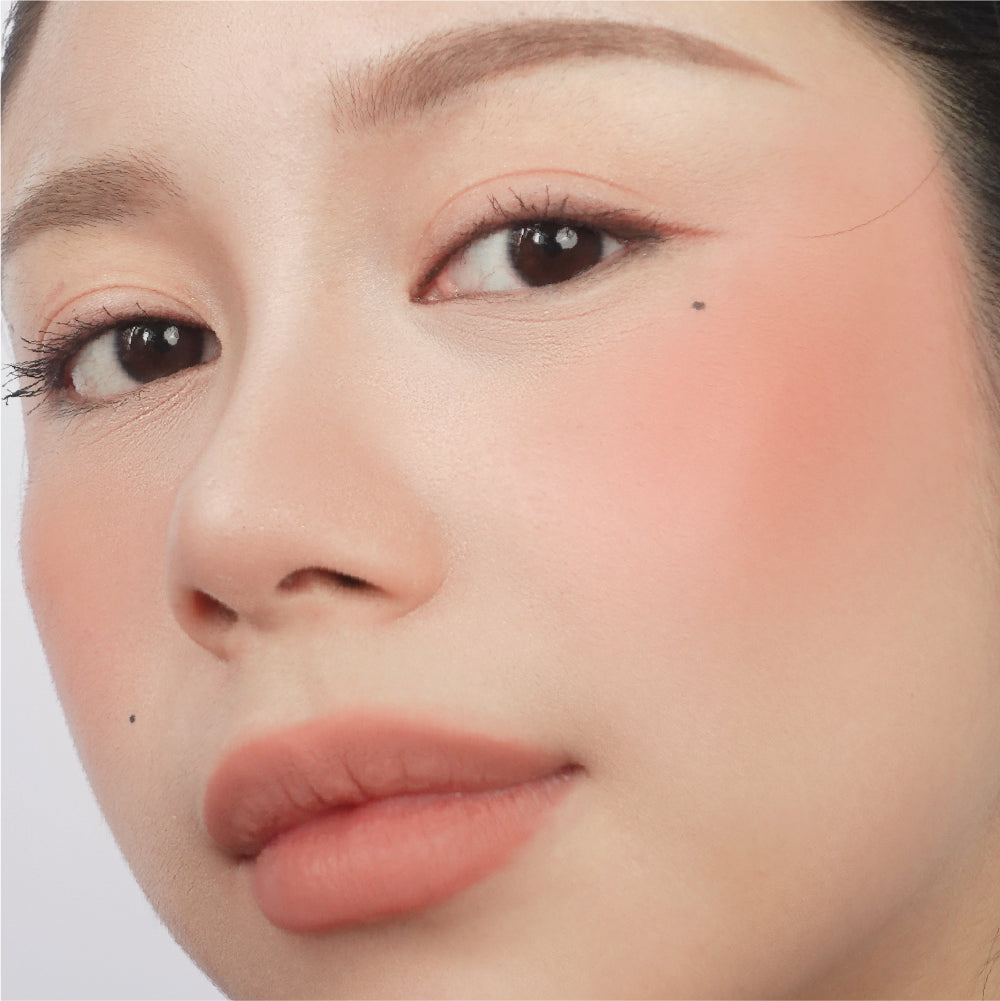 Hyaluronic Liquid Blush in Just Peachy on fair skin
