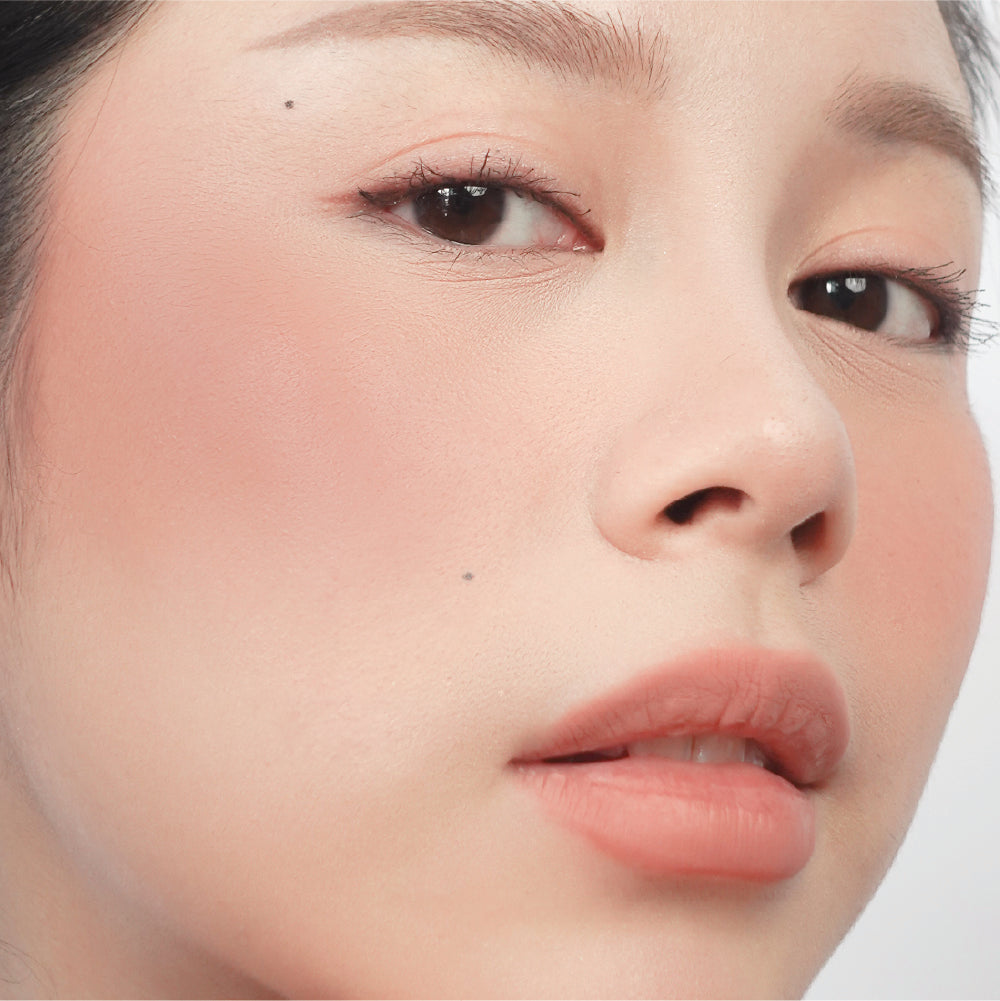 Hyaluronic Liquid Blush in Left On Red on fair skin