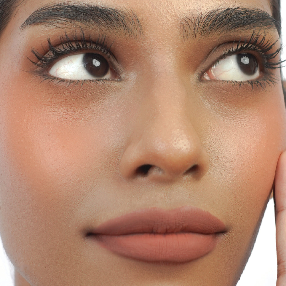 Hyaluronic Liquid Blush in Peachy Behaviour on tan skin