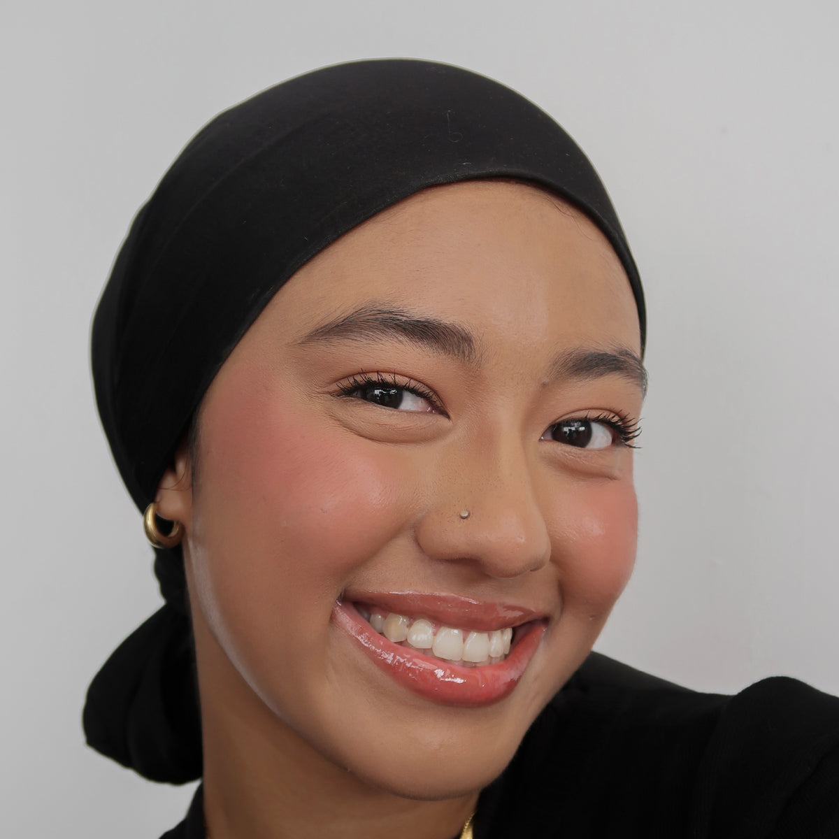 Peptide Glo Lip Oil in Honey Toast worn on model (3 of 4)