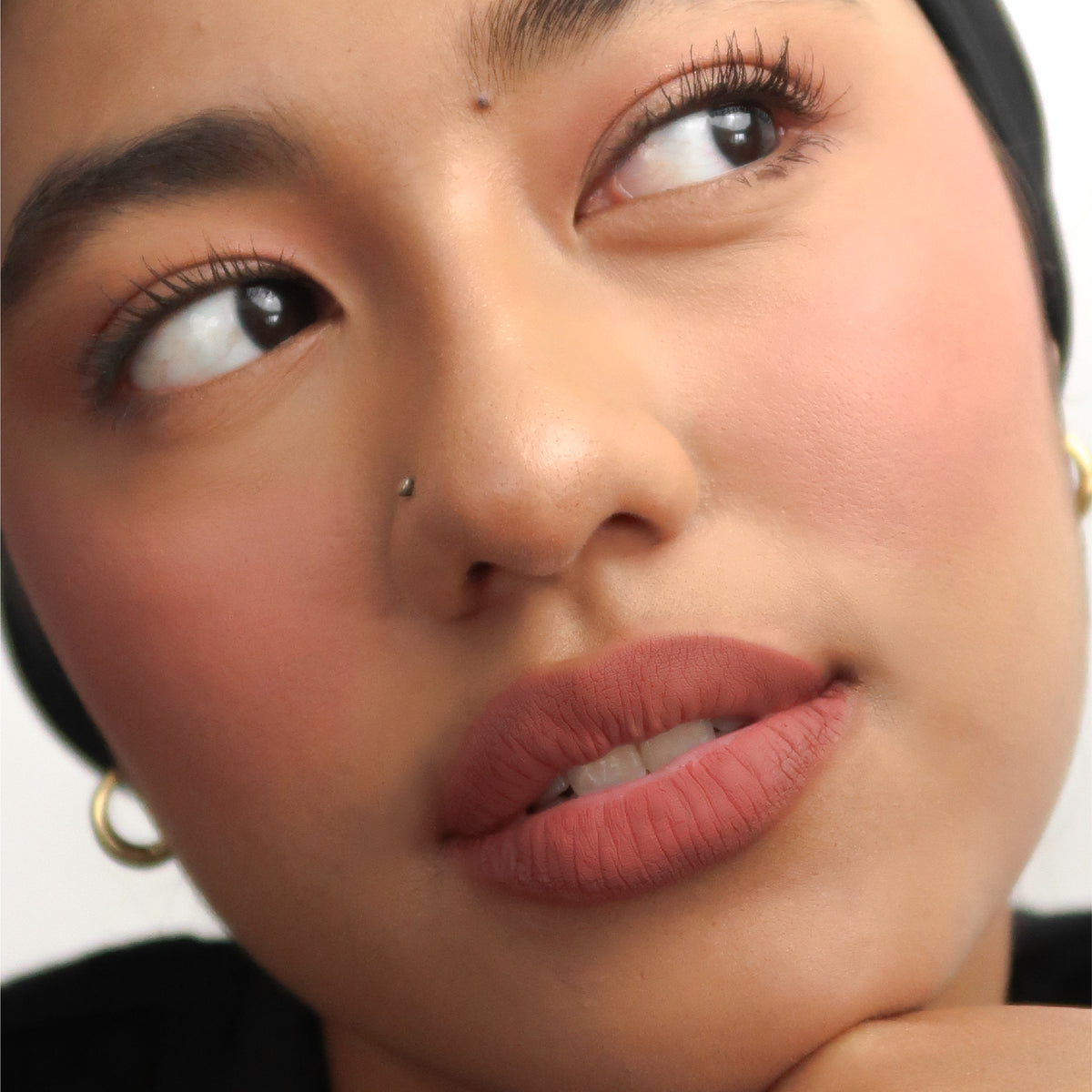 Peptide Hydra-Matte Lipstick in High Profile on medium skin