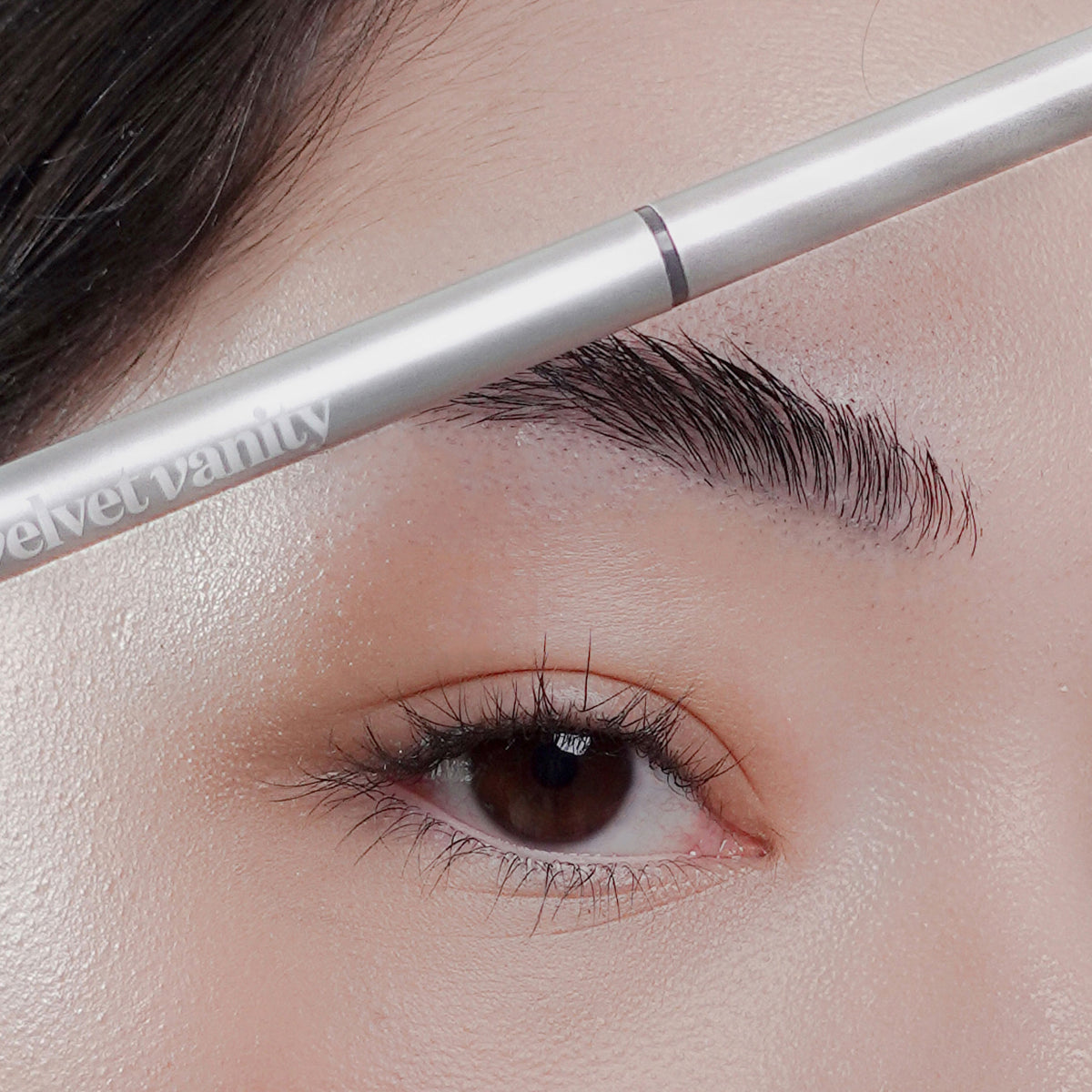 Soft Trace Brow Pencil in Dark Brown on fair skin