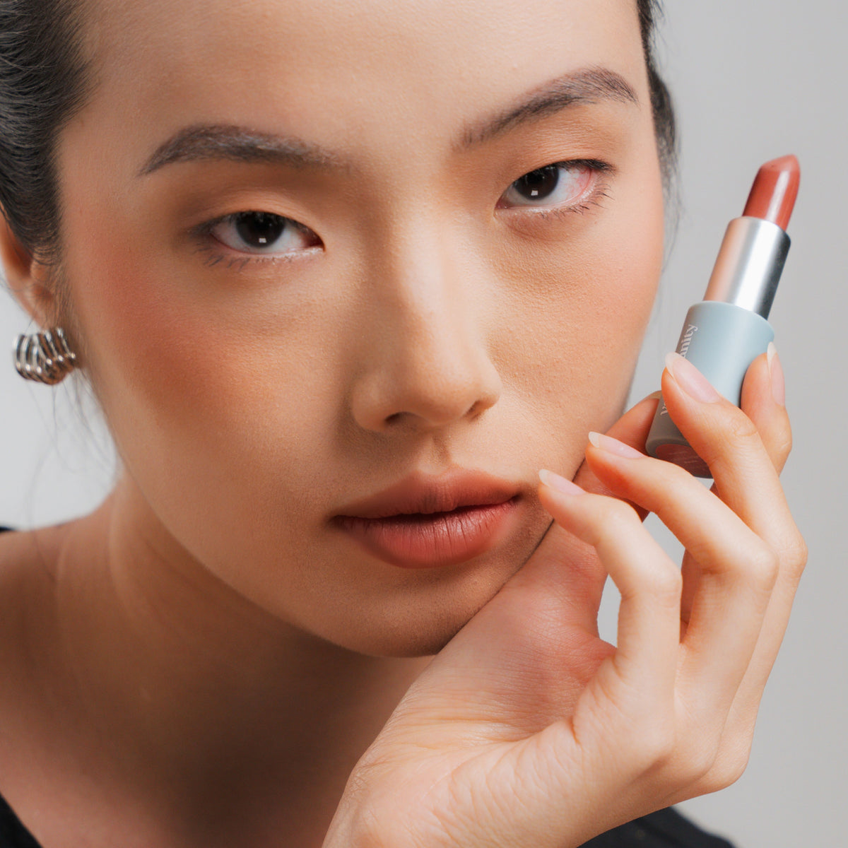 Soft Blur Glide-On Lipstick in Biscotti on fair skin