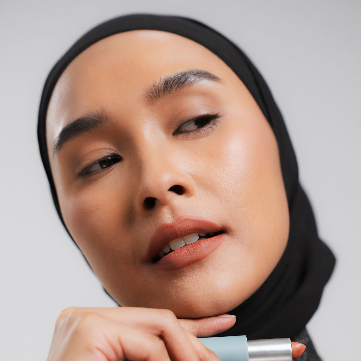 Soft Blur Glide-On Lipstick in Biscotti on medium skin