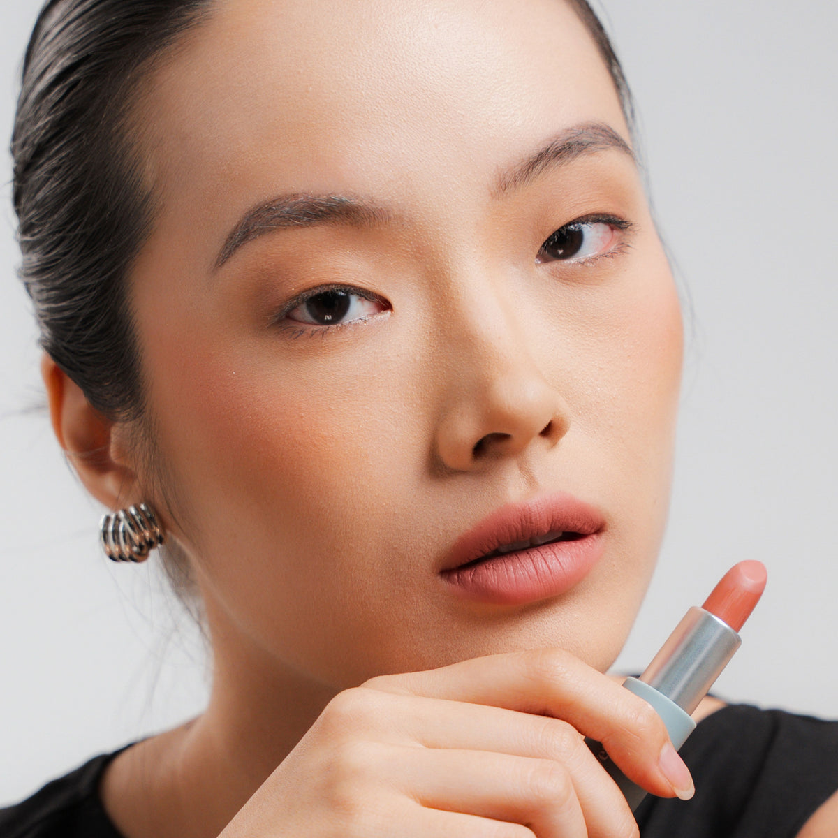 Soft Blur Glide-On Lipstick in Buff on fair skin