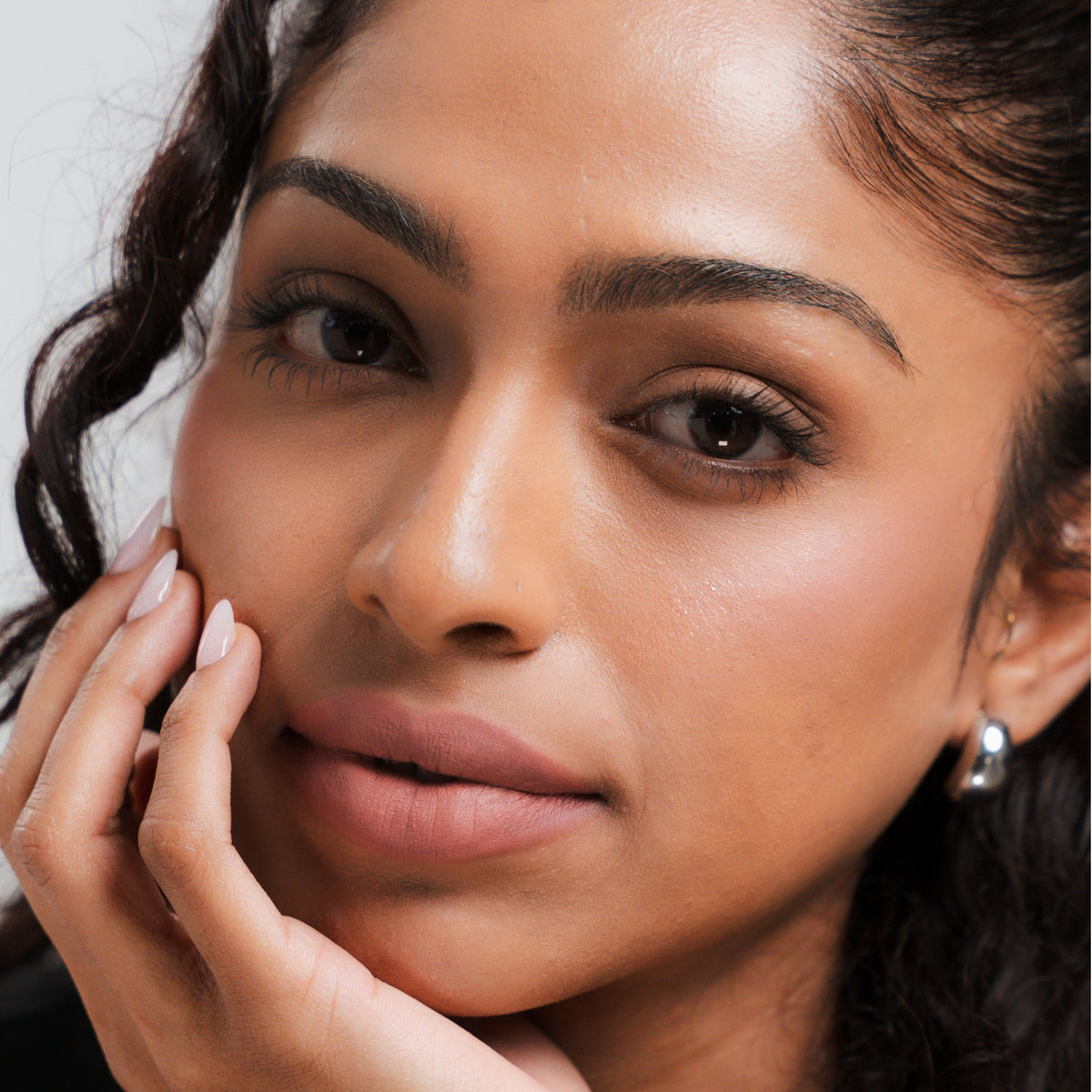 Soft Blur Glide-On Lipstick in Buff on tan skin