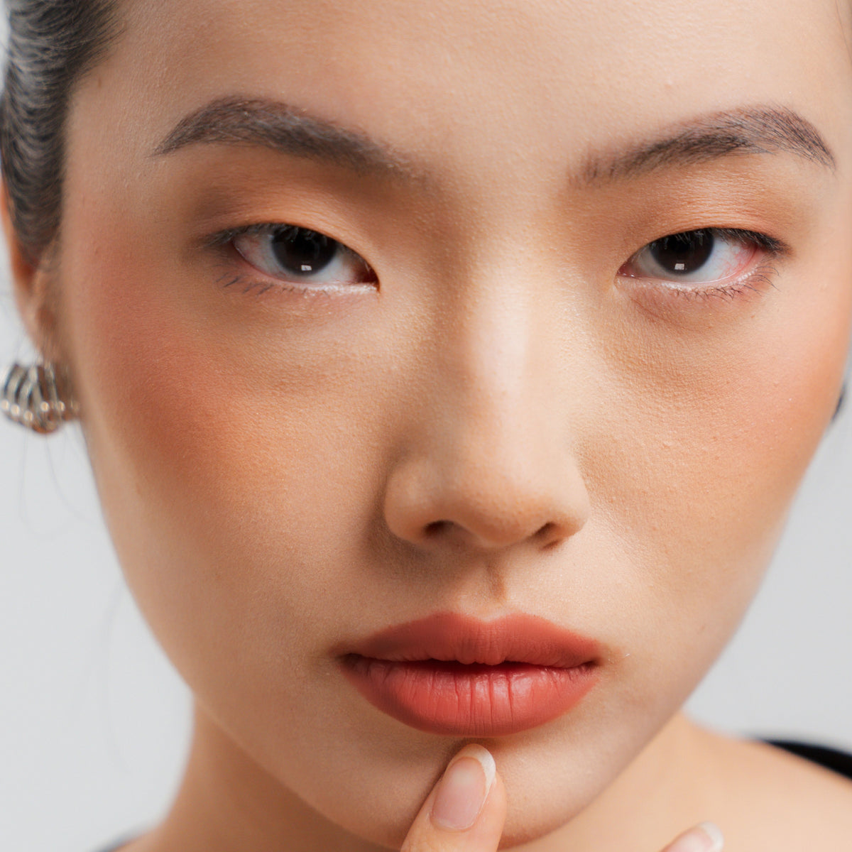Soft Blur Glide-On Lipstick in Lucky on fair skin