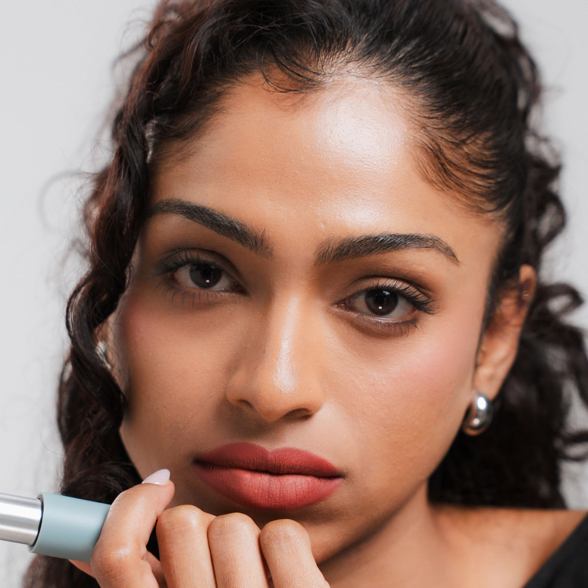 Soft Blur Glide-On Lipstick in Sorbet on tan skin