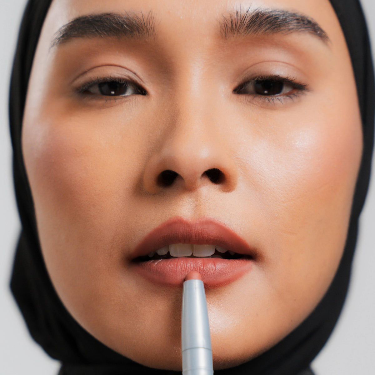 Soft Blur Lip Liner in Brick on medium skin