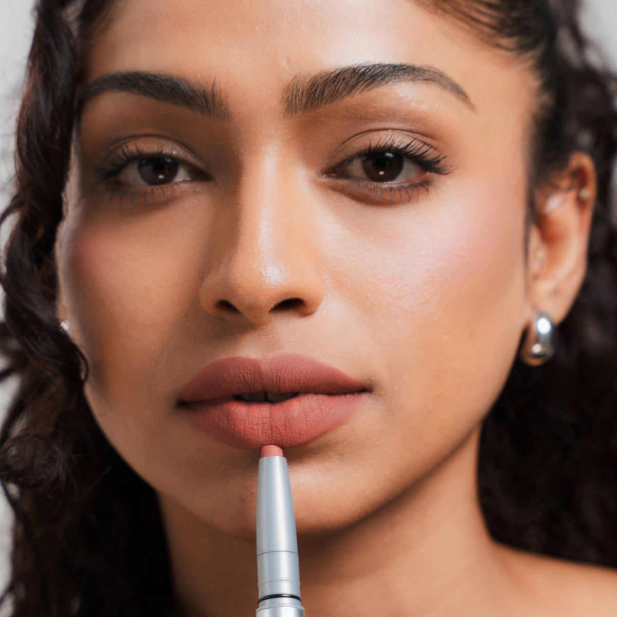 Soft Blur Lip Liner in Brick on tan skin