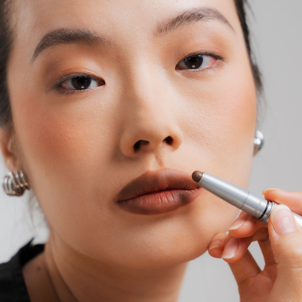 Soft Blur Lip Liner in Mocha on fair skin