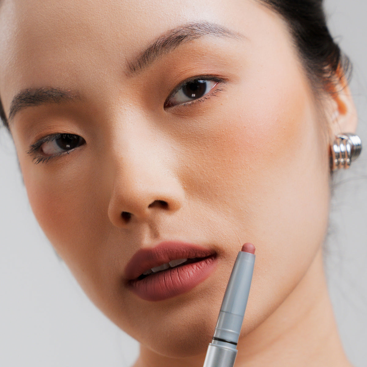 Soft Blur Lip Liner in Suede on fair skin
